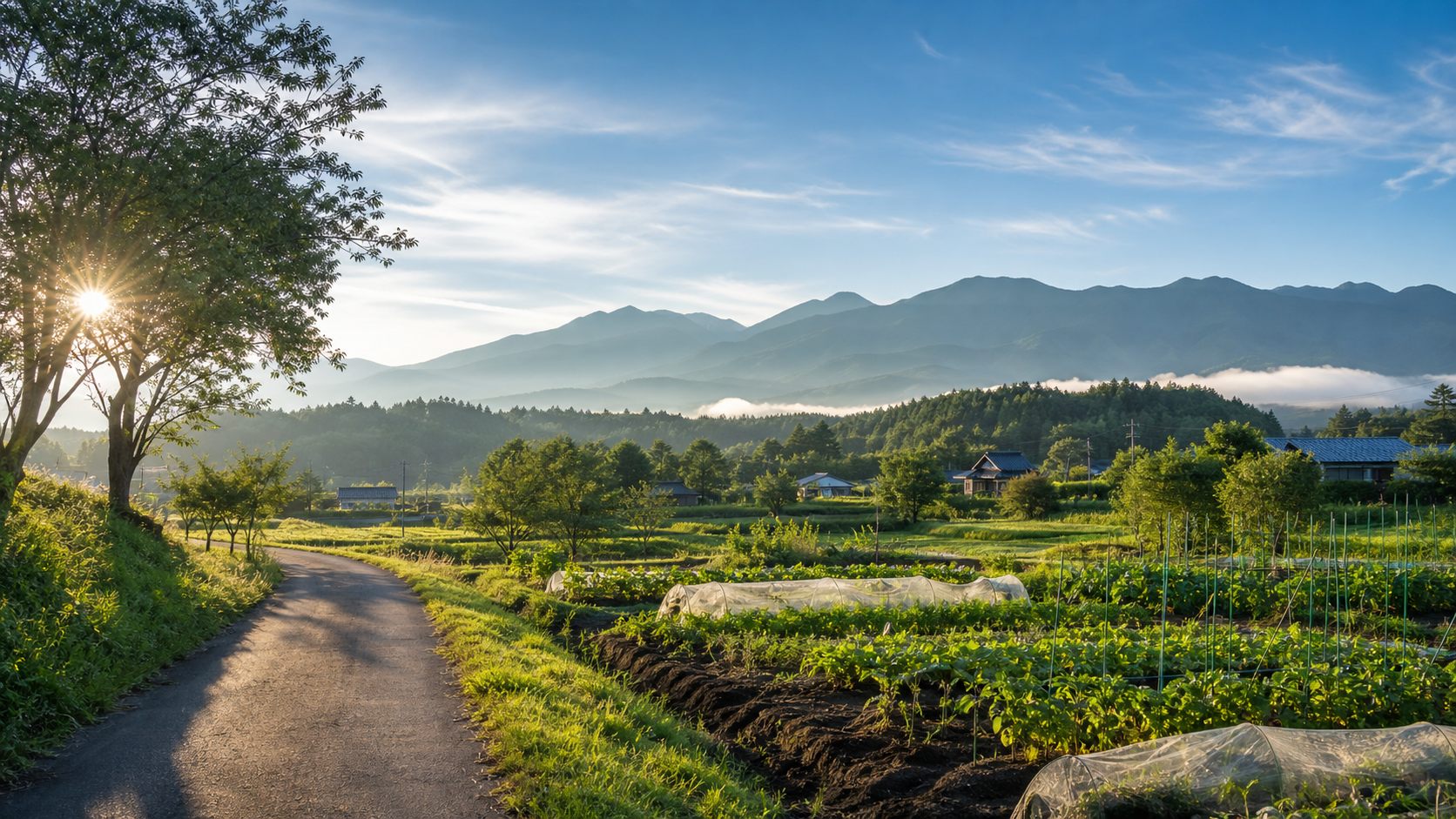 山麓の畑と生活道路がある農ある田舎暮らしのイメージ風景